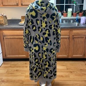 Fashion nova leopard print cardigan fits oversize but it’s a size small.